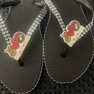 Black Flip Flops with Peace Design